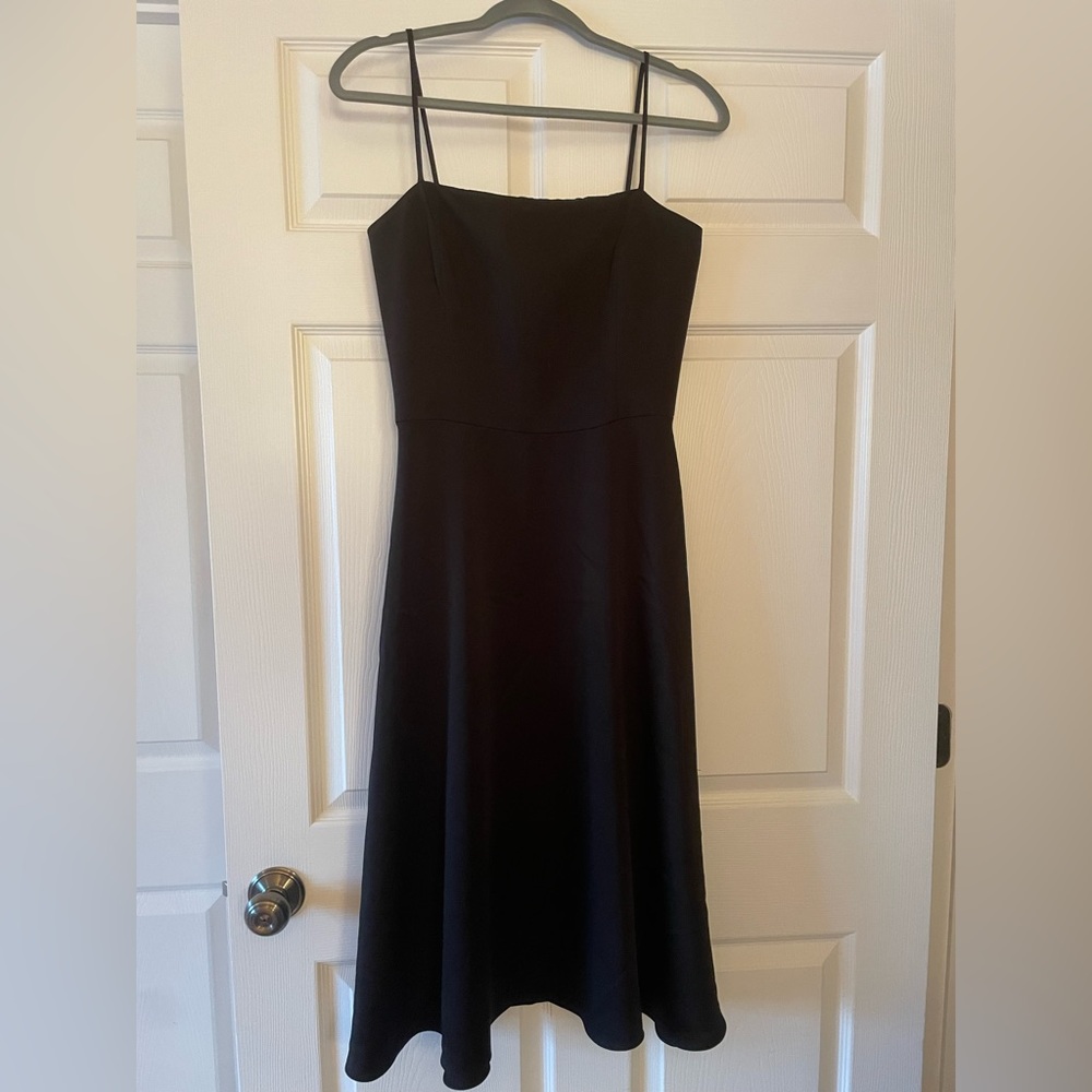 Black cocktail dress (Laundry by Shelli Segal). Size 8 in excellent condition.